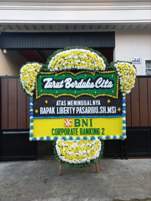Papan Bunga Duka di Utama
