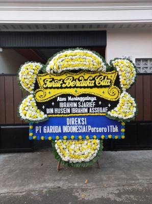 Papan Bunga Duka di Utama