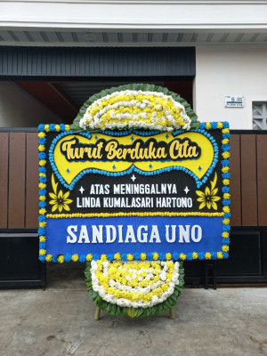 Papan Bunga Duka di Utama